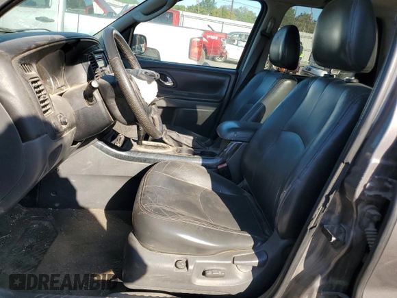 2006 Mazda Tribute S with VIN 4F2YZ06136KM31485, listed as a Copart auction lot 75412344 with Not Provided miles and Salvage Title. Bid and sale history available at DreamBid. Image 7.