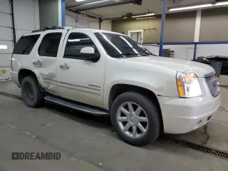 2014 GMC Yukon Denali with VIN 1GKS2EEF6ER141112, listed as a Copart auction lot 88526685 with 142,248 mi miles and Salvage Title. Bid and sale history available at carsss.com. Image 4.