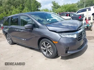 2022 Honda Odyssey Touring with VIN 5FNRL6H89NB008814, listed as a IAAI auction lot 42597738 with 49,933 mi miles and . Bid and sale history available at DreamBid. Image 1.