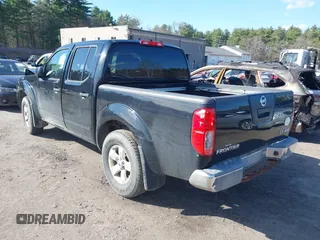 2012 Nissan Frontier SV with VIN 1N6AD0EV0CC483440, listed as a IAAI auction lot 42077098 with 104,744 mi miles and . Bid and sale history available at DreamBid. Image 3.