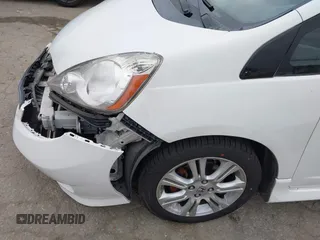 2009 Honda Fit Sport with VIN JHMGE88409S021730, listed as a IAAI auction lot 42045023 with 309,995 mi miles. Bid and sale history available at carsss.com. Image 19.