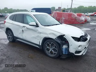 2018 BMW X1 xDrive28i with VIN WBXHT3C38J5L31322, listed as a IAAI auction lot 42260190 with 70,266 mi miles and . Bid and sale history available at DreamBid. Image 6.