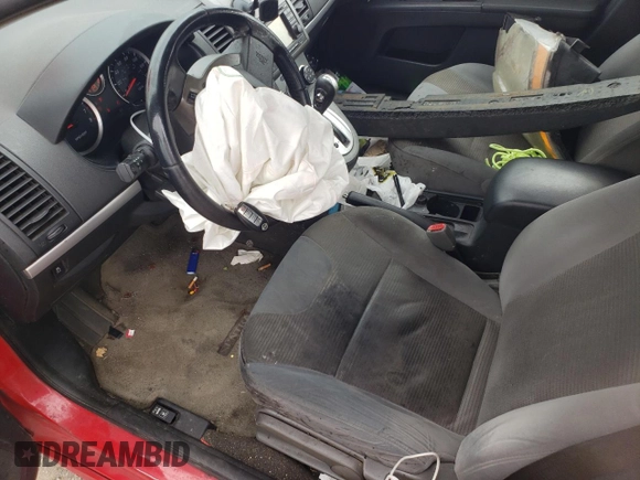 2012 Nissan Sentra S с VIN 3N1AB6AP4CL716519, выставлен на аукционе Copart как лот 54111085 с пробегом 237 618 миль миль и Списание • Salvage title. История ставок и продаж доступна на DreamBid. Изображение 7.