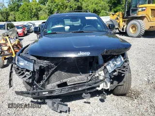 2017 Jeep Grand Cherokee Laredo with VIN 1C4RJEAG9HC780281, listed as a Copart auction lot 50747024 with 100,446 mi miles and Salvage title. Bid and sale history available at DreamBid. Image 5.