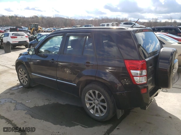 2013 Suzuki Grand Vitara Limited with VIN JS3TD0D71D4100584, listed as a Copart auction lot 79908214 with 129,543 mi miles and Salvage Title. Bid and sale history available at carsss.com. Image 2.
