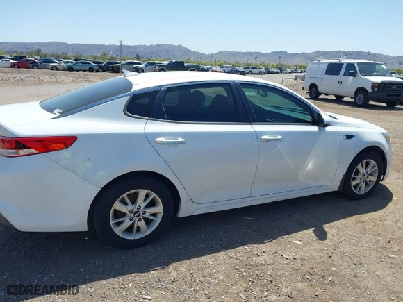 2016 Kia Optima LX with VIN 5XXGT4L33GG033022, listed as a IAAI auction lot 41981693 with 137,996 mi miles. Bid and sale history available at carsss.com. Image 13.