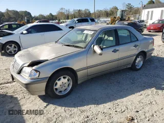 1998 Mercedes-Benz C 230/260/280/320 with VIN WDBHA23G8WA620777, listed as a Copart auction lot 77751154 with 144,032 mi miles and Salvage Title. Bid and sale history available at carsss.com. Image 1.