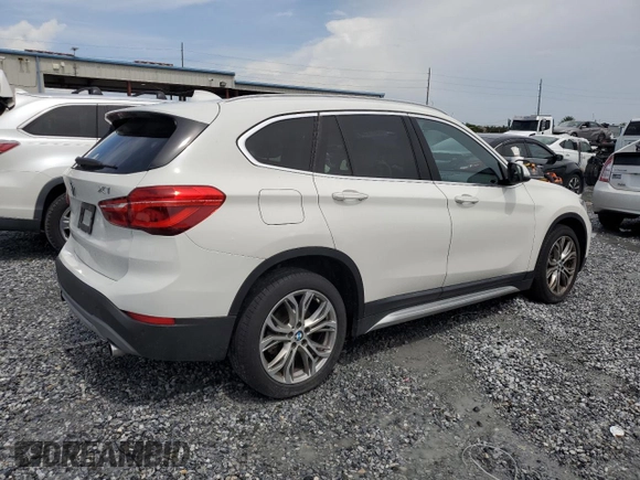 2017 BMW X1 xDrive28i with VIN WBXHT3Z37H4A55614, listed as a Copart auction lot 63491415 with 120,680 mi miles and Salvage title. Bid and sale history available at DreamBid. Image 3.