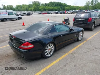 2007 Mercedes-Benz SL 550 with VIN WDBSK71F57F121921, listed as a IAAI auction lot 42537737 with 101,435 mi miles and . Bid and sale history available at DreamBid. Image 4.