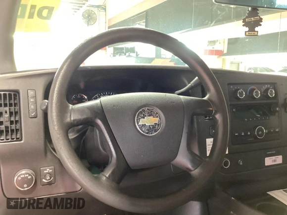 2013 Chevrolet Express Cargo with VIN 1GCSGAFX4D1156427, listed as a IAAI auction lot 42792050 with 229,858 mi miles and . Bid and sale history available at DreamBid. Image 12.