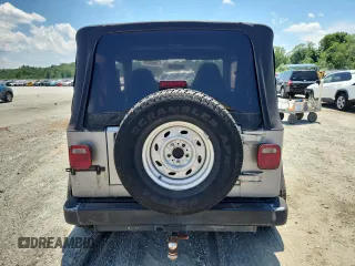 2001 Jeep Wrangler Sport with VIN 1J4FA49S21P374356, listed as a Copart auction lot 63568695 with 202,853 mi miles and Clean title. Bid and sale history available at DreamBid. Image 6.