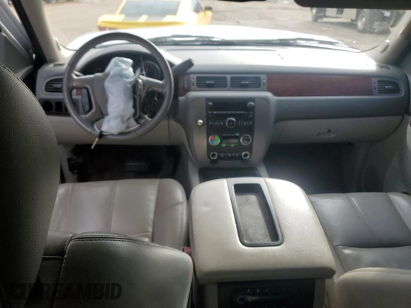 2012 GMC Yukon SLT with VIN 1GKS1CE08CR203822, listed as a Copart auction lot 82955253 with 122,508 mi miles and Salvage Title. Bid and sale history available at carsss.com. Image 8.