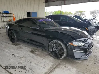 2023 Ford Mustang GT with VIN 1FA6P8CF4P5306612, listed as a Copart auction lot 56597835 with 15,216 mi miles and Salvage title. Bid and sale history available at DreamBid. Image 4.
