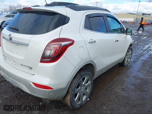 2017 Buick Encore Essence with VIN KL4CJGSB4HB081550, listed as a IAAI auction lot 41230961 with 112,991 mi miles and . Bid and sale history available at DreamBid. Image 4.