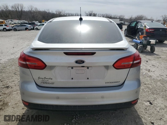 2017 Ford Focus Titanium with VIN 1FADP3J23HL347739, listed as a Copart auction lot 49385365 with 79,484 mi miles and Salvage title. Bid and sale history available at DreamBid. Image 6.