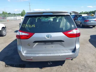 2015 Toyota Sienna L with VIN 5TDZK3DCXFS594786, listed as a IAAI auction lot 42292618 with 180,119 mi miles and . Bid and sale history available at DreamBid. Image 16.