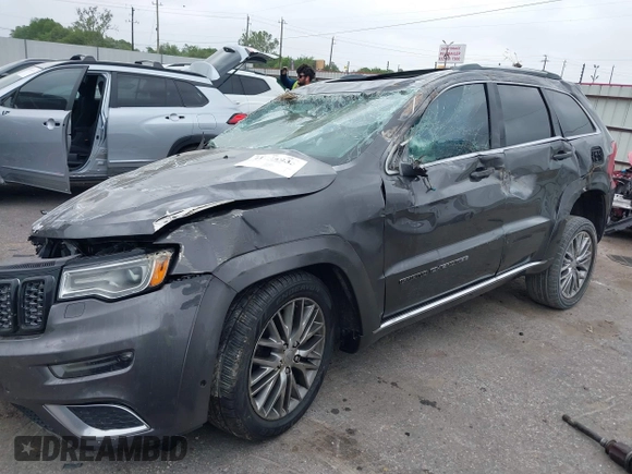 2018 Jeep Grand Cherokee Summit with VIN 1C4RJFJT1JC370907, listed as a IAAI auction lot 41944933 with 110,597 mi miles and . Bid and sale history available at DreamBid. Image 16.