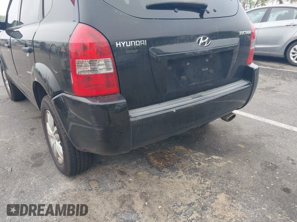 2009 Hyundai Tucson GLS with VIN KM8JM12B59U990027, listed as a IAAI auction lot 42195935 with 170,875 mi miles. Bid and sale history available at carsss.com. Image 6.