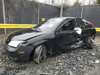 2005 Ford Focus with VIN 3FAHP31N65R146202, listed as a Copart auction lot 50226415 with 184,919 mi miles and Salvage title. Bid and sale history available at DreamBid. Image 1.