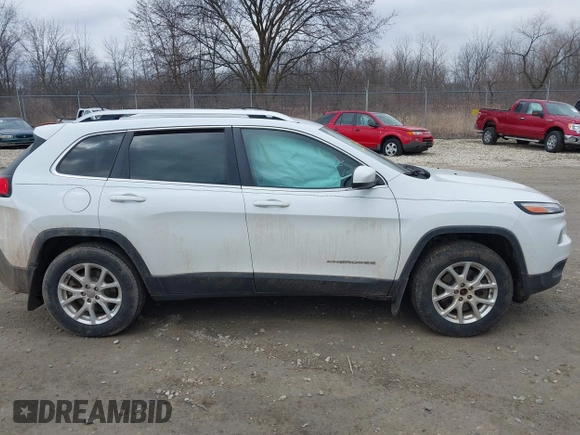 2015 Jeep Cherokee North with VIN 1C4PJMCS6FW564435, listed as a IAAI auction lot 41992440 with 166,048 mi miles. Bid and sale history available at carsss.com. Image 13.