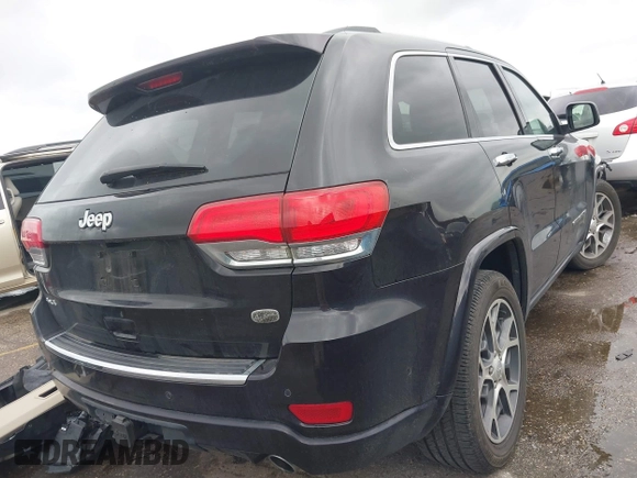 2021 Jeep Grand Cherokee Overland z VIN 1C4RJFCG4MC621214, wystawiony jako IAAI lot #42188010 z przebiegiem 15 559 mil mil oraz . Historia ofert i sprzedaży dostępna na DreamBid. Obrazek 4.