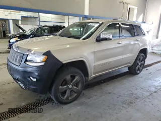 2015 Jeep Grand Cherokee Overland with VIN 1C4RJFCG7FC673181, listed as a Copart auction lot 46527875 with 124,503 mi miles and Salvage title. Bid and sale history available at DreamBid. Image 1.