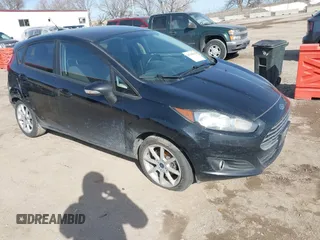 2016 Ford Fiesta SE with VIN 3FADP4EJ3GM170260, listed as a IAAI auction lot 41769063 with 137,970 mi miles. Bid and sale history available at carsss.com. Image 1.