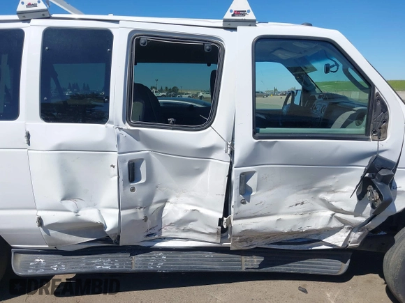 2014 Ford Econoline Passenger XL with VIN 1FBNE3BL7EDA37146, listed as a IAAI auction lot 41871526 with 139,387 mi miles. Bid and sale history available at carsss.com. Image 6.