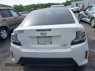 2014 Scion tC z VIN JTKJF5C77E3082073, wystawiony jako IAAI lot #42107615 z przebiegiem 223 895 mil mil oraz . Historia ofert i sprzedaży dostępna na DreamBid. Obrazek 16.