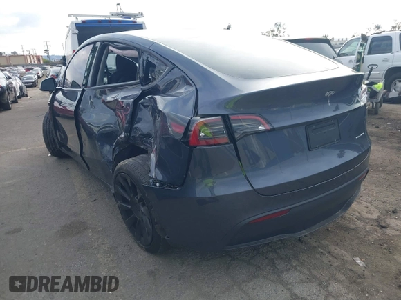 2023 Tesla Model Y Long Range with VIN 7SAYGDEE4PA028440, listed as a IAAI auction lot 41488136 with 29,229 mi miles and . Bid and sale history available at DreamBid. Image 3.