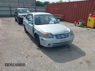 2005 Hyundai Accent GLS z VIN KMHCG45C35U577765, wystawiony jako IAAI lot #42375410 z przebiegiem 244 866 mil mil oraz . Historia ofert i sprzedaży dostępna na DreamBid. Obrazek 1.