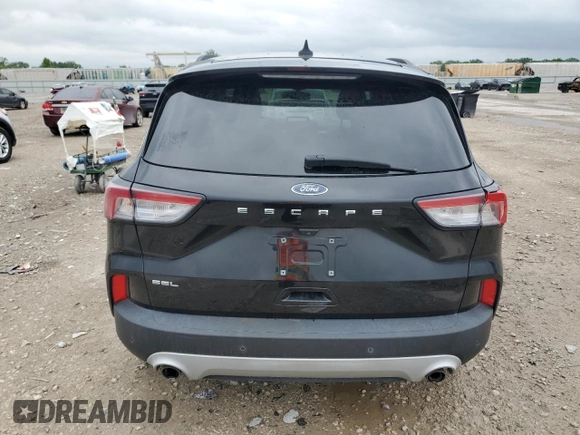 2021 Ford Escape SEL с VIN 1FMCU0H61MUA06930, выставлен на аукционе Copart как лот 57509265 с пробегом 62 354 миль миль и Чистый • Clean title. История ставок и продаж доступна на DreamBid. Изображение 6.