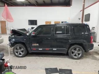2014 Jeep Patriot Latitude with VIN 1C4NJPFA9ED887903, listed as a IAAI auction lot 41228274 with 82,225 mi miles and . Bid and sale history available at carsss.com. Image 14.