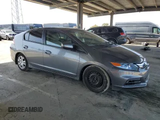 2013 Honda Insight with VIN JHMZE2H3XDS003838, listed as a Copart auction lot 52220235 with 144,729 mi miles and Salvage title. Bid and sale history available at DreamBid. Image 4.