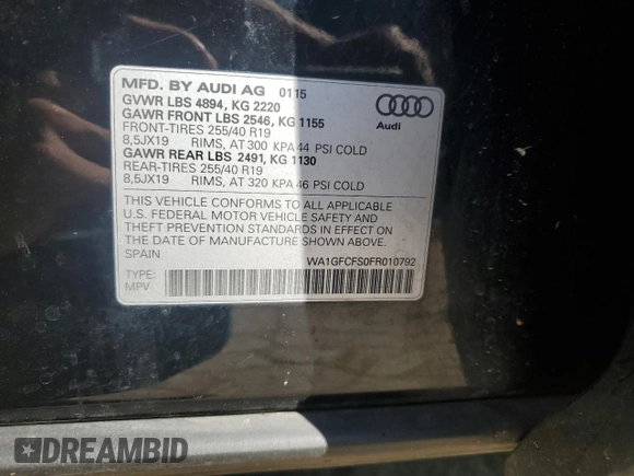 2015 Audi Q3 Prestige with VIN WA1GFCFS0FR010792, listed as a Copart auction lot 54068064 with 121,415 mi miles and Salvage title. Bid and sale history available at DreamBid. Image 12.
