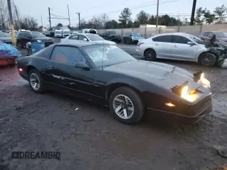 1990 Pontiac Firebird with VIN 1G2FS23TXLL205077, listed as a Copart auction lot 44035705 with 142,809 mi miles and Salvage title. Bid and sale history available at DreamBid. Image 4.