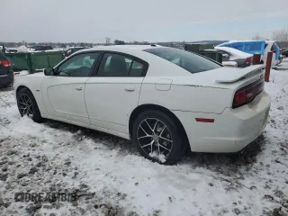 2013 Dodge Charger RT with VIN 2C3CDXDT5DH673399, listed as a Copart auction lot 82433364 with 184,376 mi miles and Clean Title. Bid and sale history available at carsss.com. Image 2.
