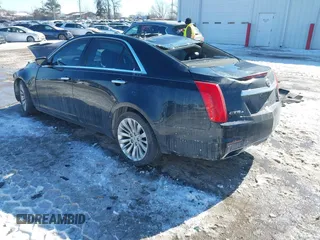 2014 Cadillac CTS Luxury AWD with VIN 1G6AX5SX3E0191673, listed as a IAAI auction lot 41617087 with 68,581 mi miles and . Bid and sale history available at DreamBid. Image 3.