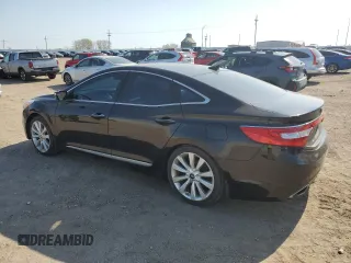 2014 Hyundai Azera Limited z VIN KMHFH4JG3EA424176, wystawiony jako Copart lot #55837825 z przebiegiem 133 781 mil mil oraz Szkoda całkowita • Salvage title. Historia ofert i sprzedaży dostępna na DreamBid. Obrazek 2.