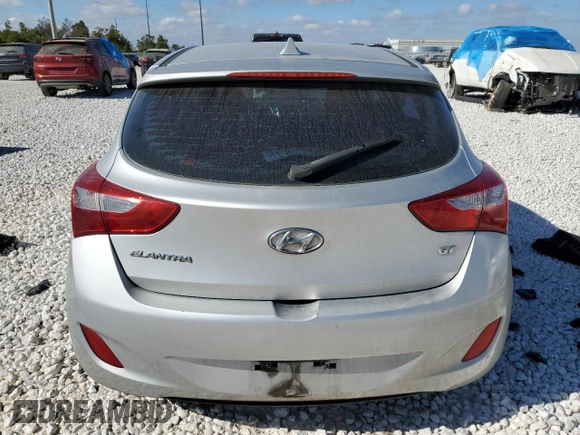 2013 Hyundai Elantra GT with VIN KMHD35LE1DU029594, listed as a Copart auction lot 77214544 with Not Provided miles and Salvage Title. Bid and sale history available at carsss.com. Image 6.