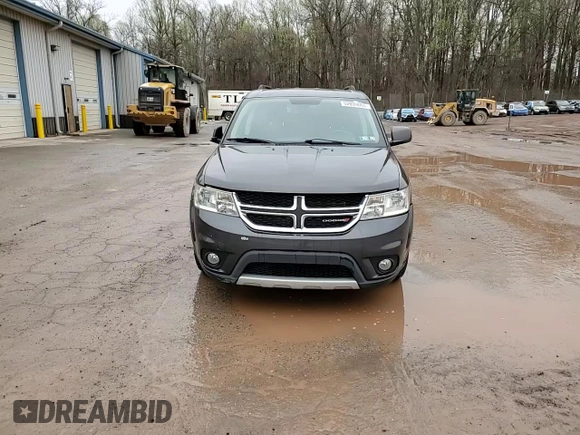 2016 Dodge Journey SXT with VIN 3C4PDDBG8GT242018, listed as a Copart auction lot 52899665 with 132,567 mi miles and Salvage Title. Bid and sale history available at DreamBid. Image 14.