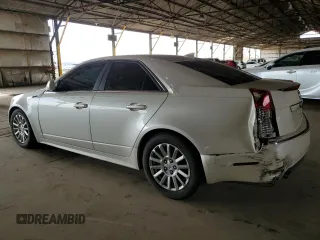 2012 Cadillac CTS with VIN 1G6DA5E52C0131731, listed as a Copart auction lot 59223235 with 104,521 mi miles and Salvage title. Bid and sale history available at DreamBid. Image 2.