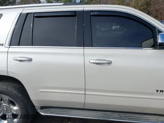 2015 Chevrolet Tahoe LTZ with VIN 1GNSCCKC2FR140524, listed as a IAAI auction lot 41592878 with 284,785 mi miles. Bid and sale history available at carsss.com. Image 13.