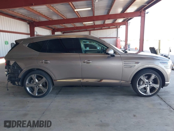 2021 Genesis GV80 with VIN KMUHCESC5MU031187, listed as a IAAI auction lot 42003804 with 65,909 mi miles and . Bid and sale history available at DreamBid. Image 14.