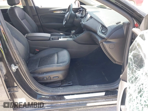 2018 Buick Regal Essence with VIN W04GP6SX5J1120700, listed as a IAAI auction lot 42334588 with 131,926 mi miles and . Bid and sale history available at DreamBid. Image 5.
