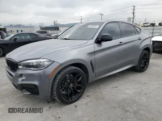 2018 BMW X6 sDrive35i with VIN 5UXKU0C52J0G81057, listed as a Copart auction lot 50698205 with 67,735 mi miles and Salvage Title. Bid and sale history available at carsss.com. Image 1.