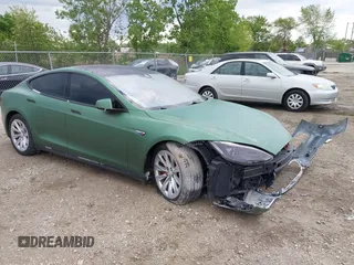 2015 Tesla Model S 85D z VIN 5YJSA1S24FF094338, wystawiony jako IAAI lot #42326671 z przebiegiem Nie podano mil oraz . Historia ofert i sprzedaży dostępna na DreamBid. Obrazek 1.