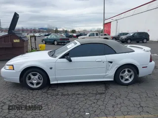2004 Ford Mustang Deluxe with VIN 1FAFP446X4F134860, listed as a IAAI auction lot 41755643 with 174,410 mi miles. Bid and sale history available at carsss.com. Image 6.