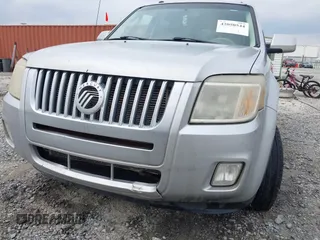2009 Mercury Mariner Premier z VIN 4M2CU87G59KJ25154, wystawiony jako IAAI lot #42050544 z przebiegiem 210 905 mil mil oraz . Historia ofert i sprzedaży dostępna na DreamBid. Obrazek 6.