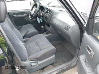 1997 Toyota RAV4 with VIN JT3HP10V6V7051229, listed as a IAAI auction lot 42762280 with 228,719 mi miles and . Bid and sale history available at DreamBid. Image 5.